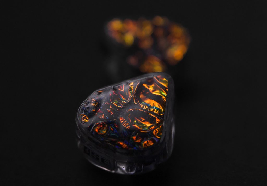 Macro of the Hexad II dichroic fire faceplate in low light