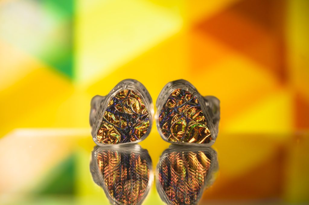 Hexad II pair against colored stained-glass light